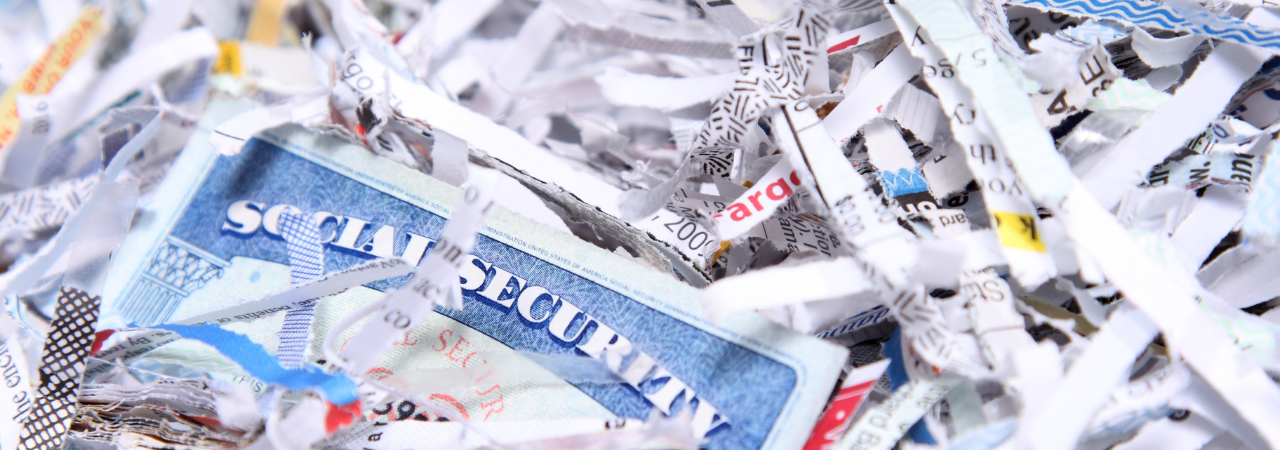 a pile of shredded financial paperwork to prevent identity thieves from stealing your personal information