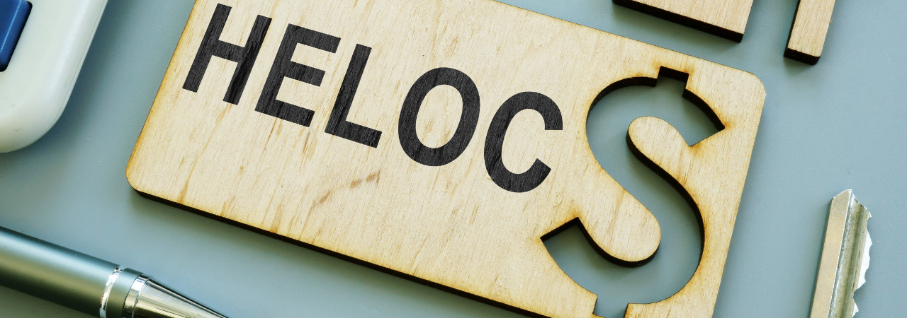 wooden cutout of the word HELOC